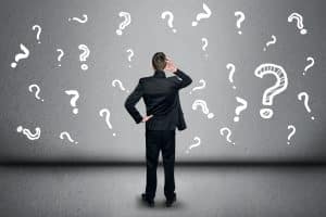 A man with question marks